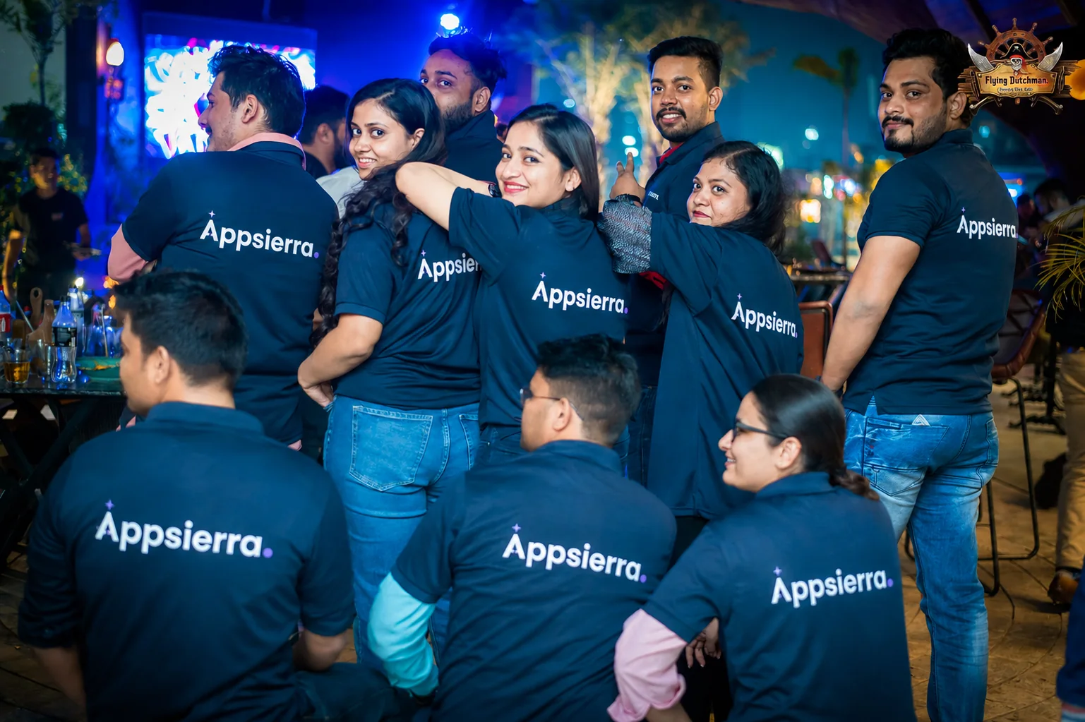 Appsierra team members in branded Appsierra shirts at a company team event in India